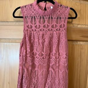 Sleeveless laced high neck tunic